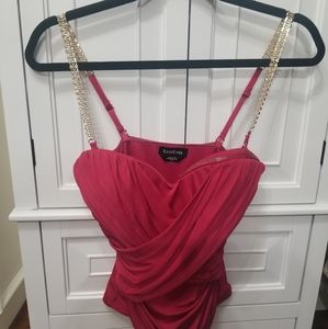 Sexy beautiful bebe top. Side zipper. Gold chain removal straps.